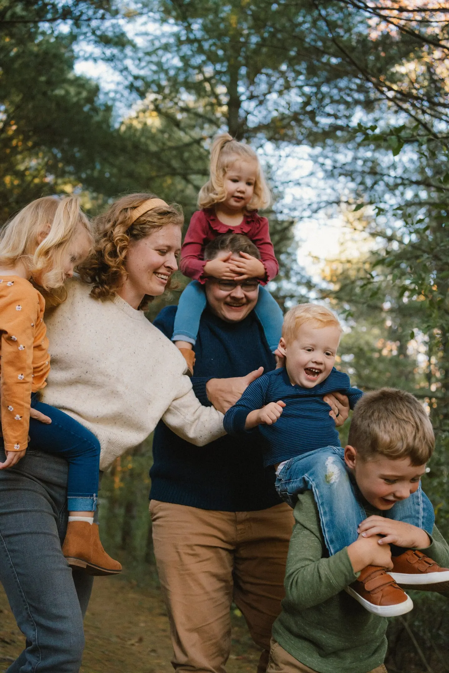 playful family session outdoors with big family in Charlottesville, VA