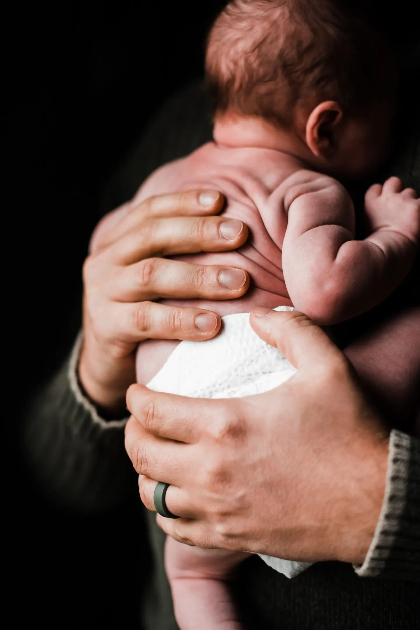 close up newborn photo details of baby skin
