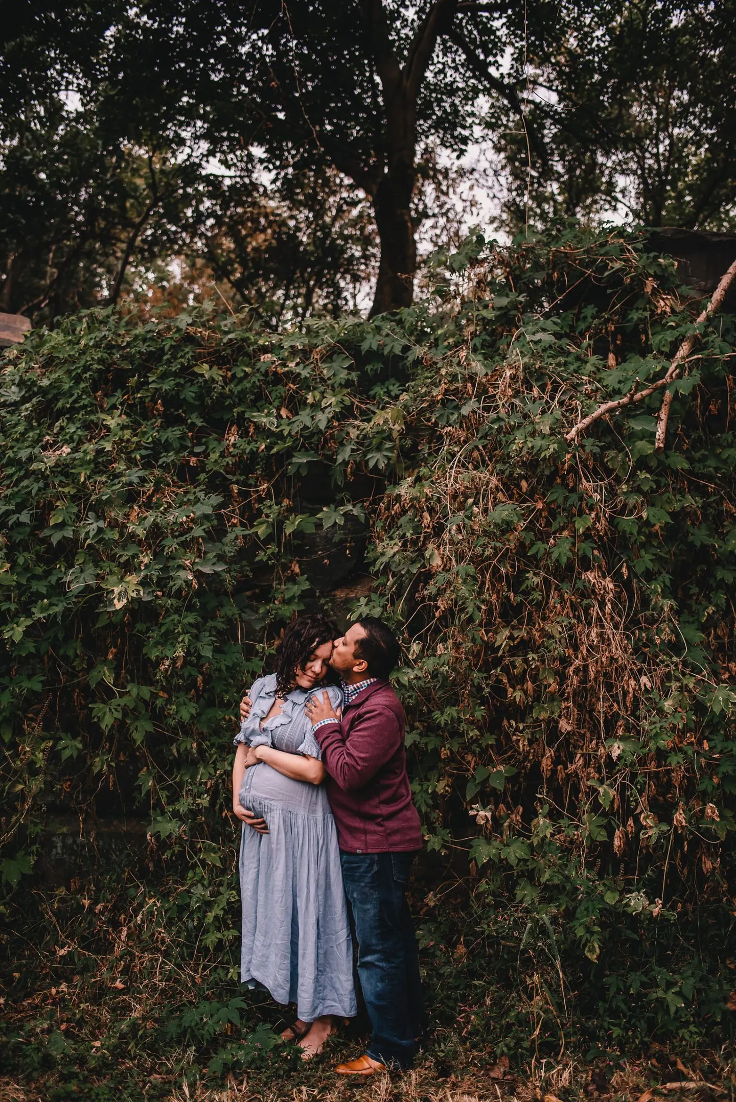 maternity session pose with couple outdoors by charlottesville maternity photographer
