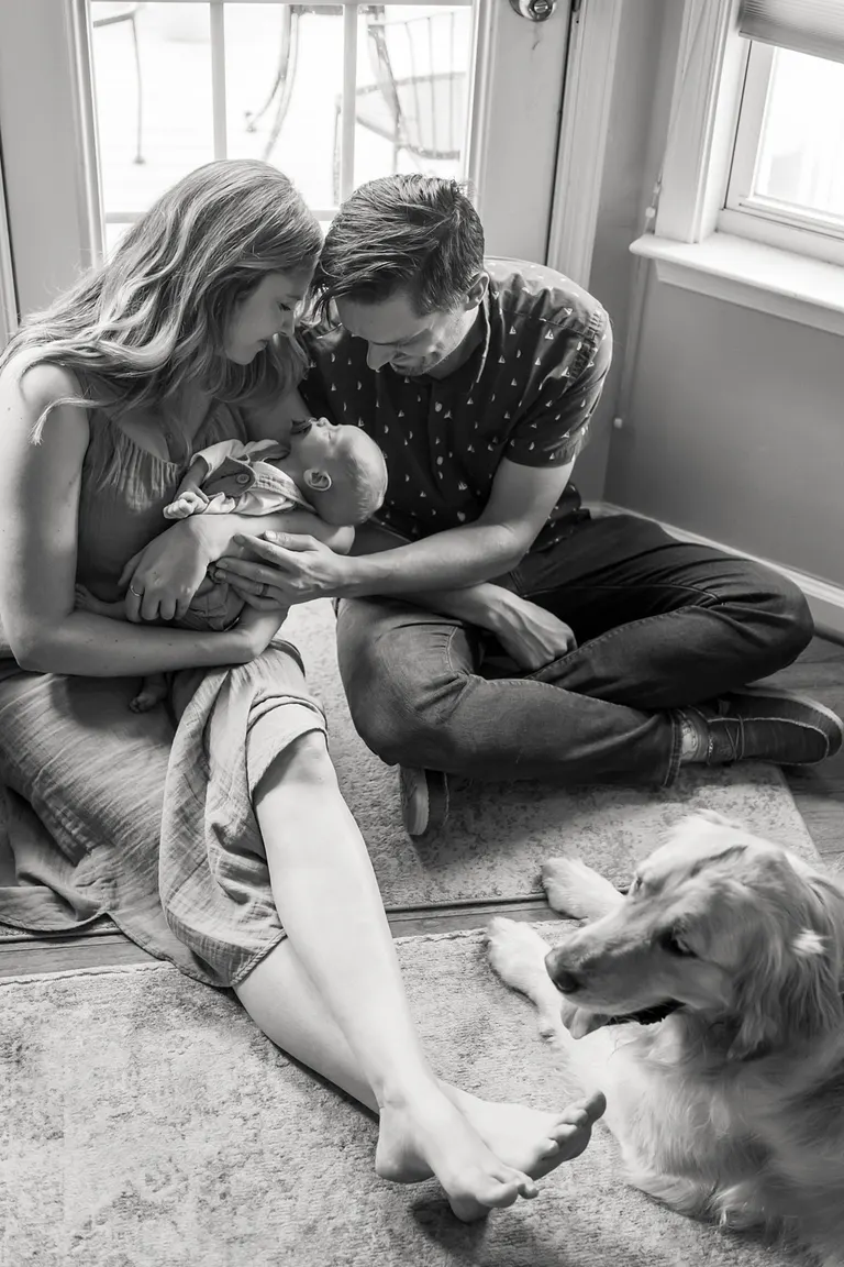 natural poses for family with newborn baby and dog