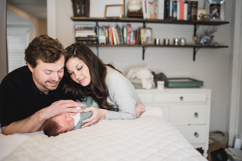 newbornphotoswithbabyonbed