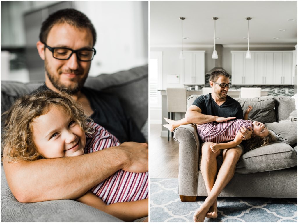 father daughter poses for family photos at home