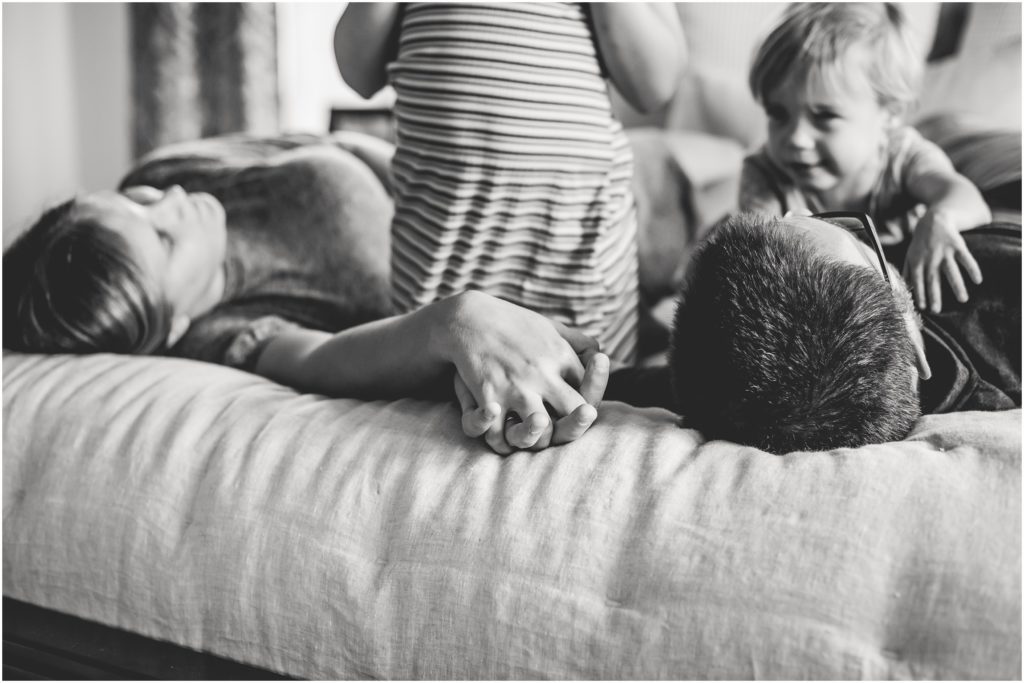 natural family photos at home, family lying on the bed pose