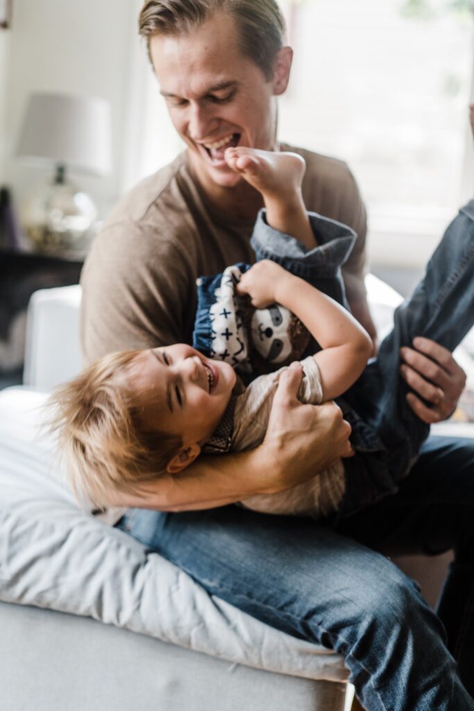 playful family photos at home