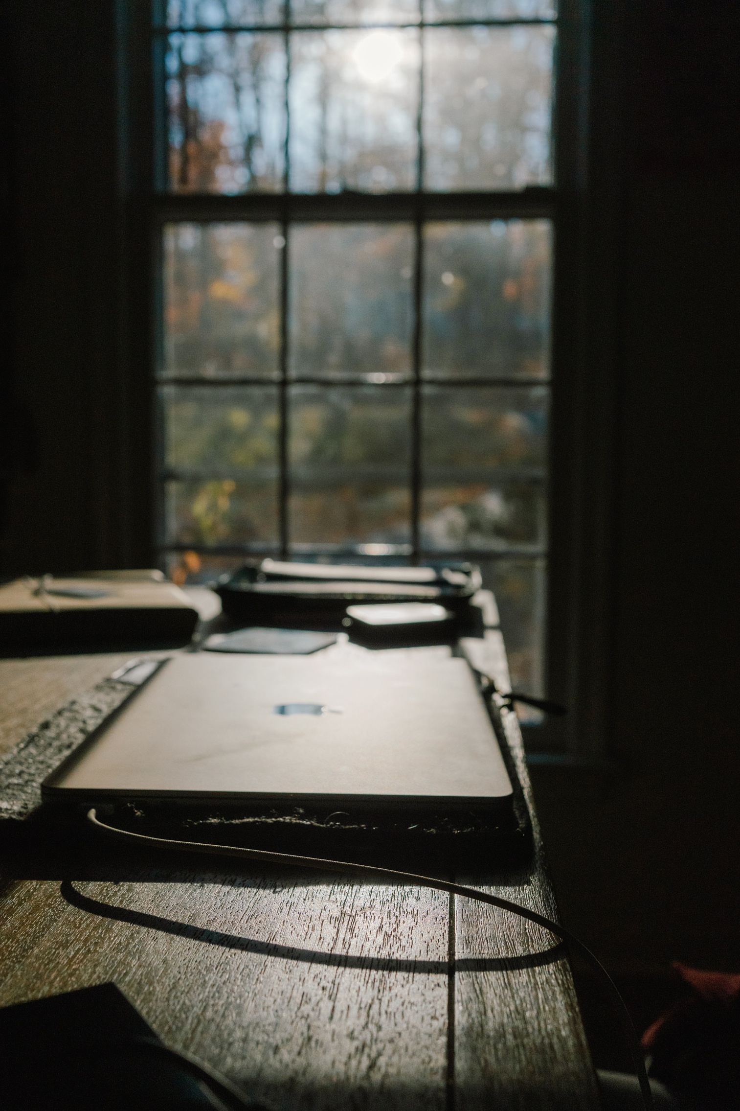 slow season for family photographers, laptop closed on a desk