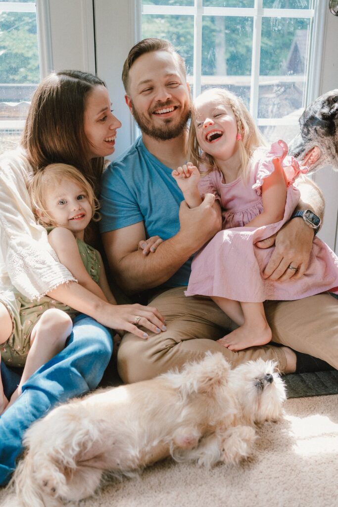 lifestyle family photos with two kids and dogs