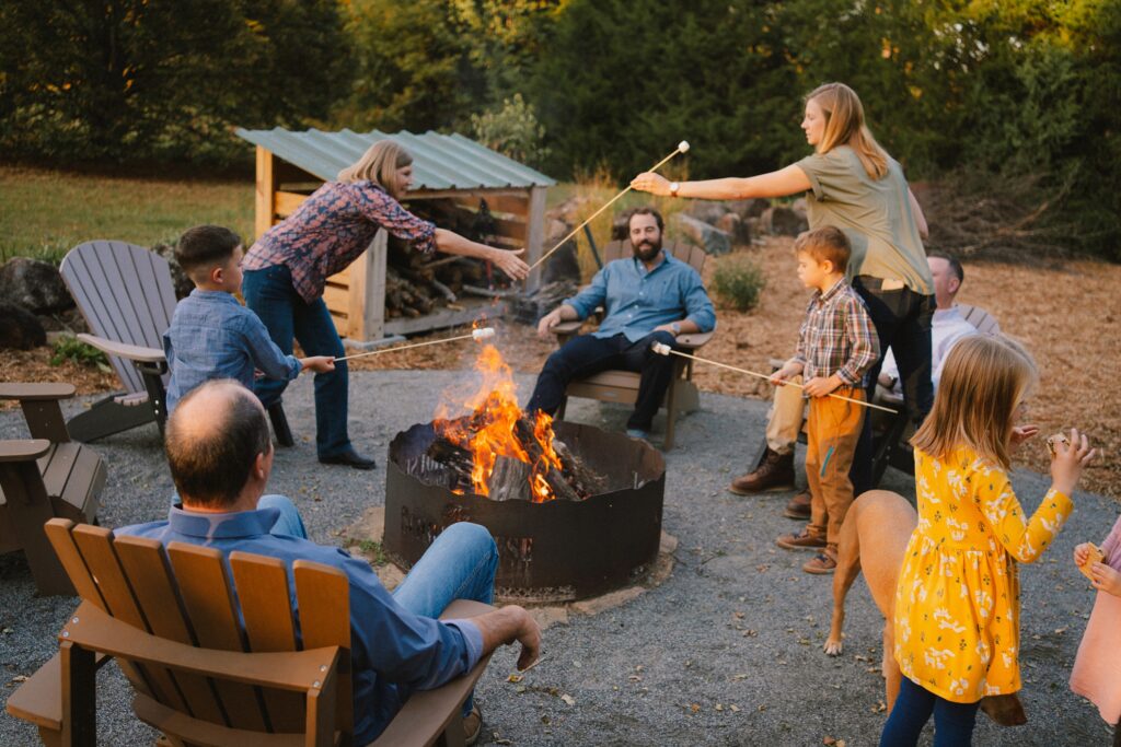extended family photos in charlottesville, fall bonfire making s'mores